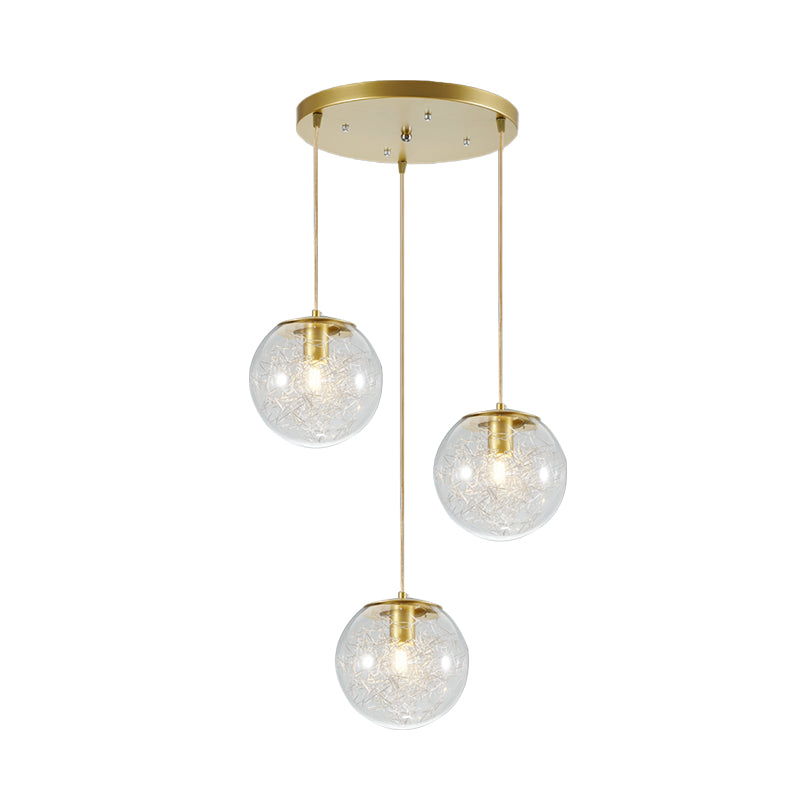 Minimalist Pumpkin Ball Multi Light Pendant Clear Glass 3 Lights Coffee House Hanging Lamp in Gold with Metal Line Deco Inside