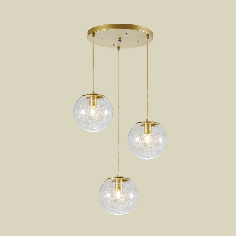 Minimalist Pumpkin Ball Multi Light Pendant Clear Glass 3 Lights Coffee House Hanging Lamp in Gold with Metal Line Deco Inside