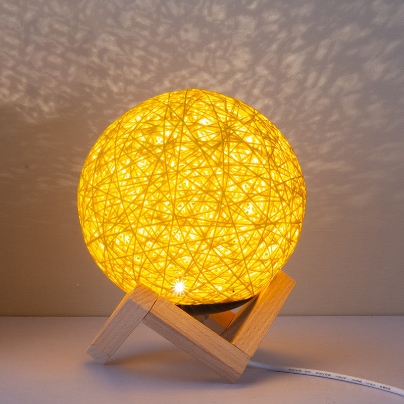 Lampada notturna di bambù Globe contemporanea 1 illuminazione da tavolo da finitura giallo chiaro con base di legno
