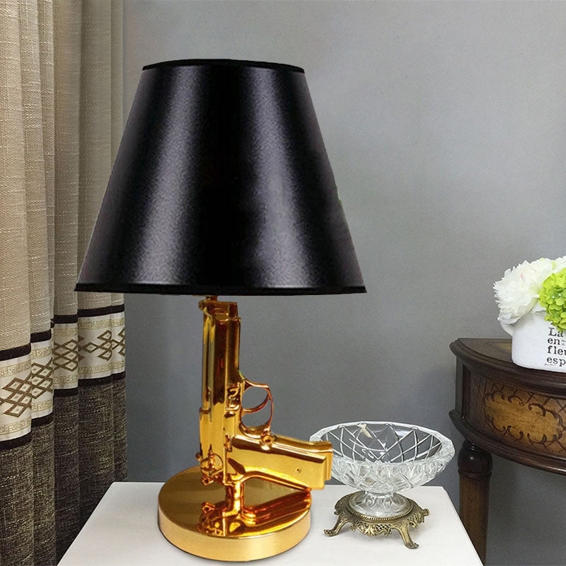 Black Finish Barrel Shade Table Light Modernist 1-Head Fabric Desk Lamp with Gold Gun-Shape Body
