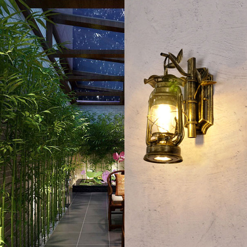 Industrial Lantern Sconce 1 Head Clear Glass Wall Mount Light Fixture in Bronze/Copper with Metal Bamboo Backplate
