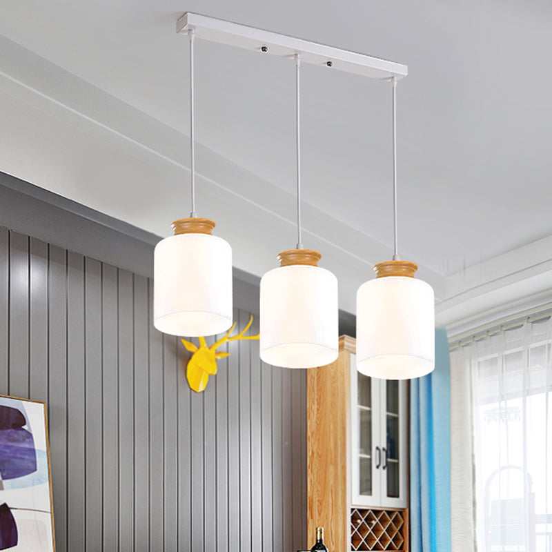 Zylinder mehrleichter Kronleuchter modernes weißes Glas 3 Köpfe Holzsuspensionslampe mit runden/linearen Baldachin