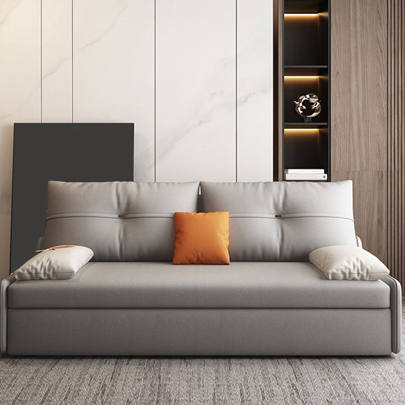 Glam Grey Futon Sleeper Sofa with Tufted Back and Storage in Faux Leather