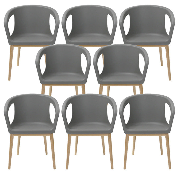 Contemporary Dining Armchair in Plastic with Solid Wood Legs