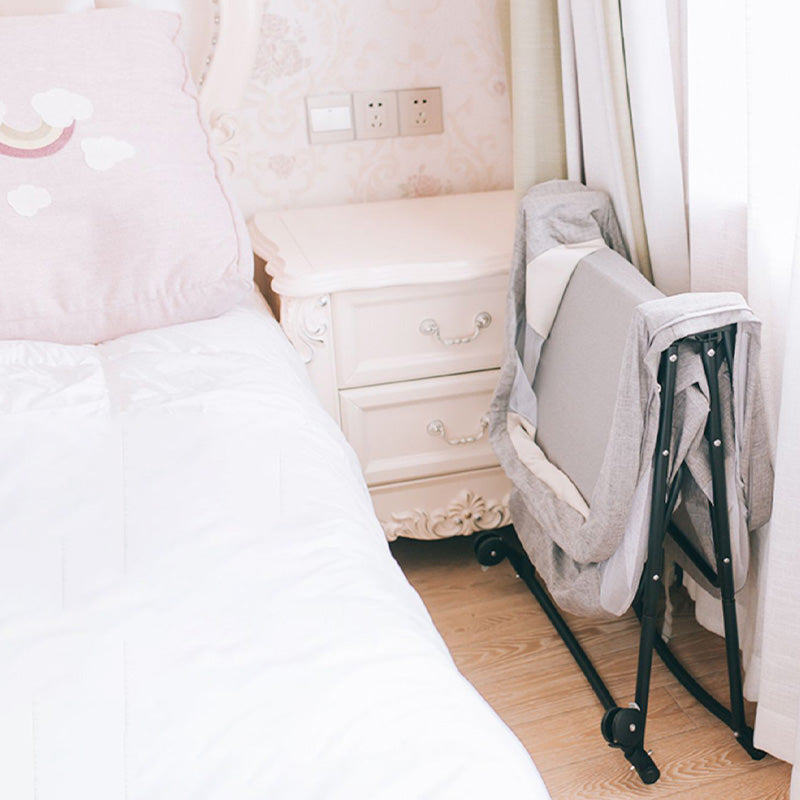 Modern Plastic Color Matching Oval Nursery Crib with Casters