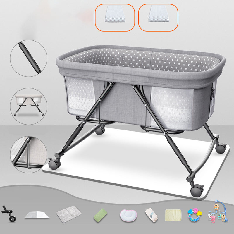 Modern Plastic Color Matching Oval Nursery Crib with Casters