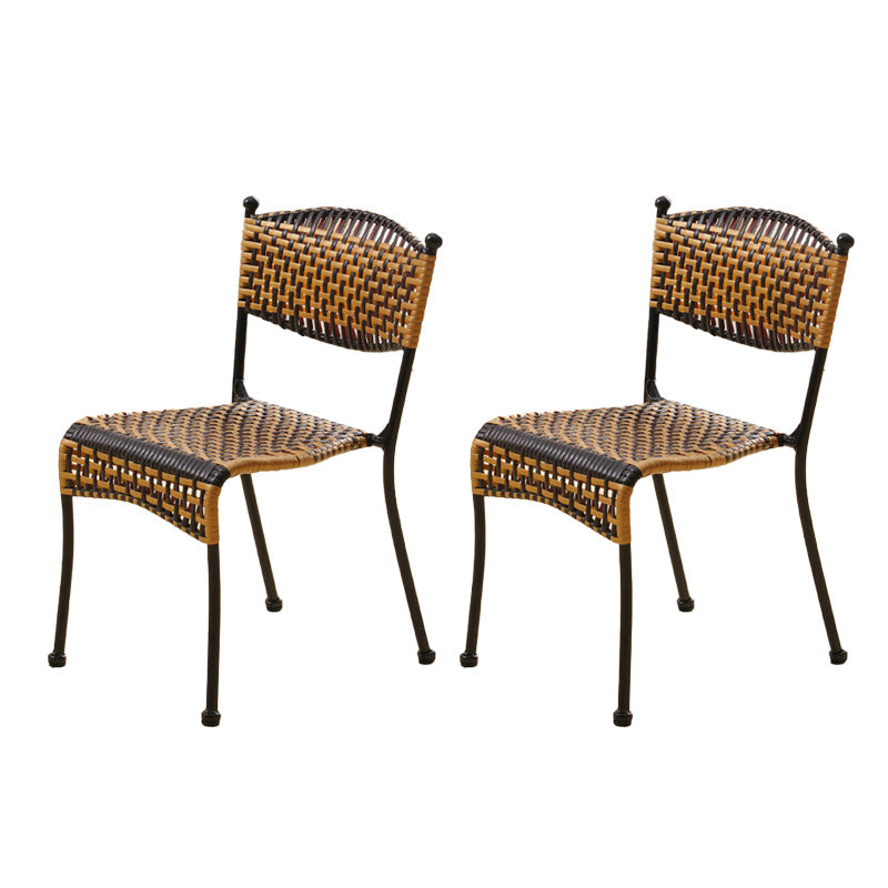 Tropical Dining Side Chair in Brown/Black Plastic with Open Back