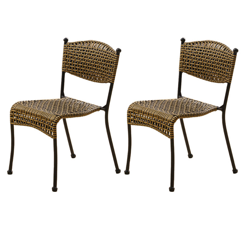 Tropical Dining Side Chair in Brown/Black Plastic with Open Back