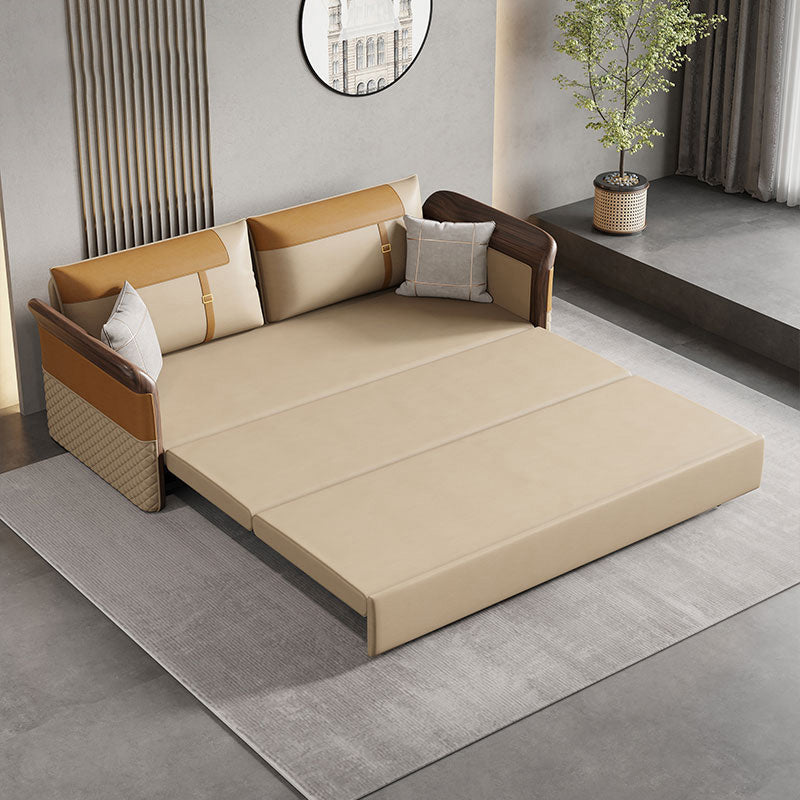 Contemporary Bonded Leather Sleeper Sofa with Pillow Back and Flared Arms