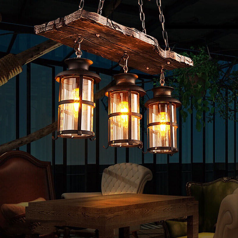 Clear Glass Lantern Island Pendant Light Industrial 2/3 Lights Bar Hanging Lamp in Black with Wood Decoration and Cage
