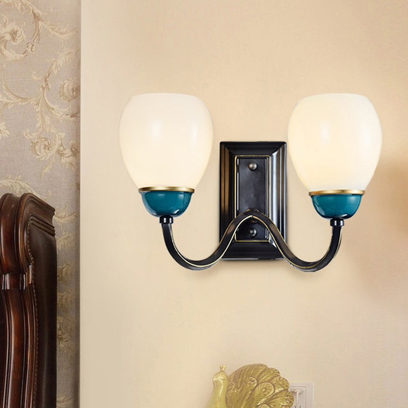 1/2-Head Globe Wall Lighting Fixture Countryside Black and Blue Opal Glass Wall Light Sconce with Curved Arm