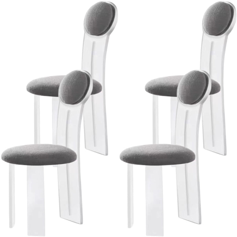 Contemporary Upholstered and Plastic Armless Dining and Accent Chairs