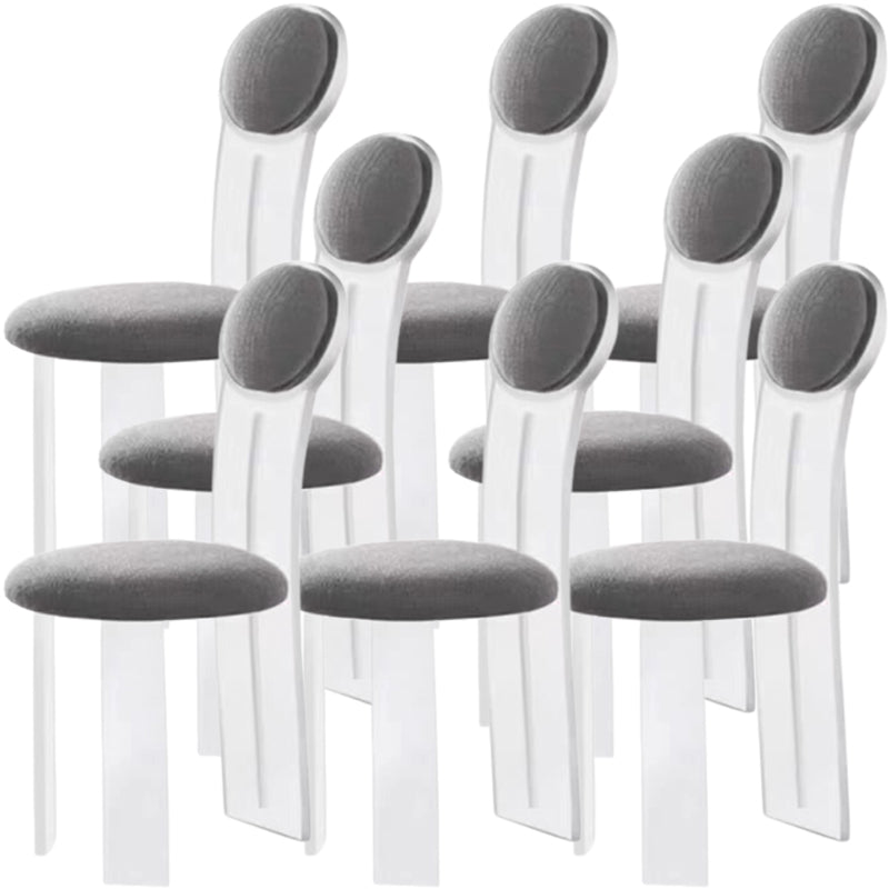 Contemporary Upholstered and Plastic Armless Dining and Accent Chairs