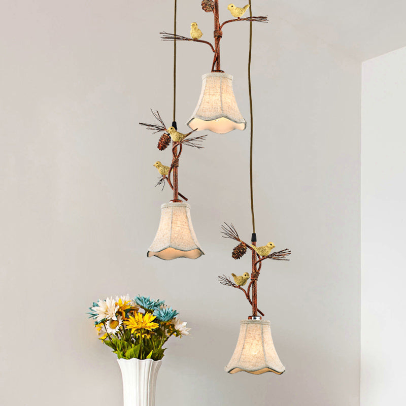 Flaxen 3/5 teste cluster a sospensione Light Country Fabric Sussion Lampada con uccello e Pinecone Deco