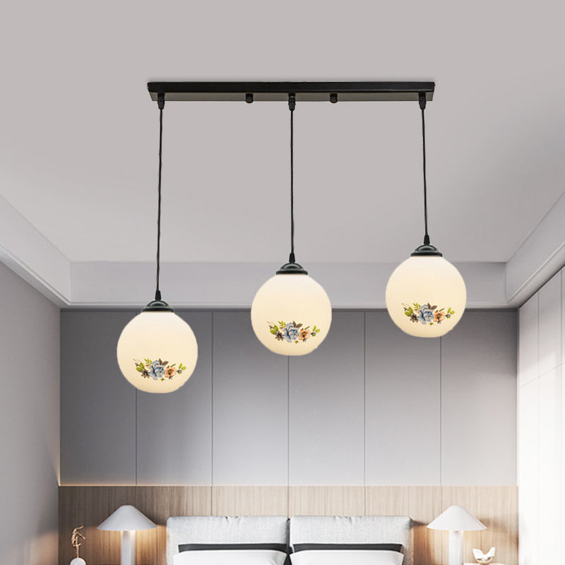 3 Heads Orb Multi-Pendant Modernism Black Finish White Frosted Glass Hanging Light Kit with Flower Pattern and Round/Linear Canopy