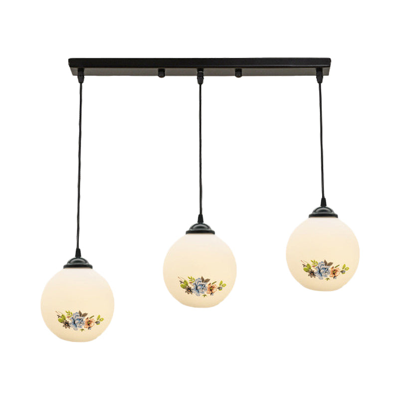 3 Heads Orb Multi-Pendant Modernism Black Finish White Frosted Glass Hanging Light Kit with Flower Pattern and Round/Linear Canopy