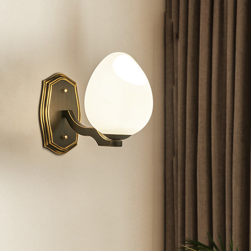 Traditionalist Egg-Like Wall Sconce Lighting 1 Light White Frosted Glass Wall Lamp in Black
