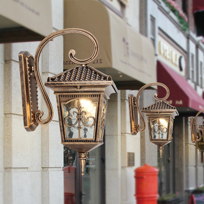 Vintage Pavilion Wall Lighting 1-Light Clear Water Glass Sconce Light in Black/Bronze with Curvy Arm