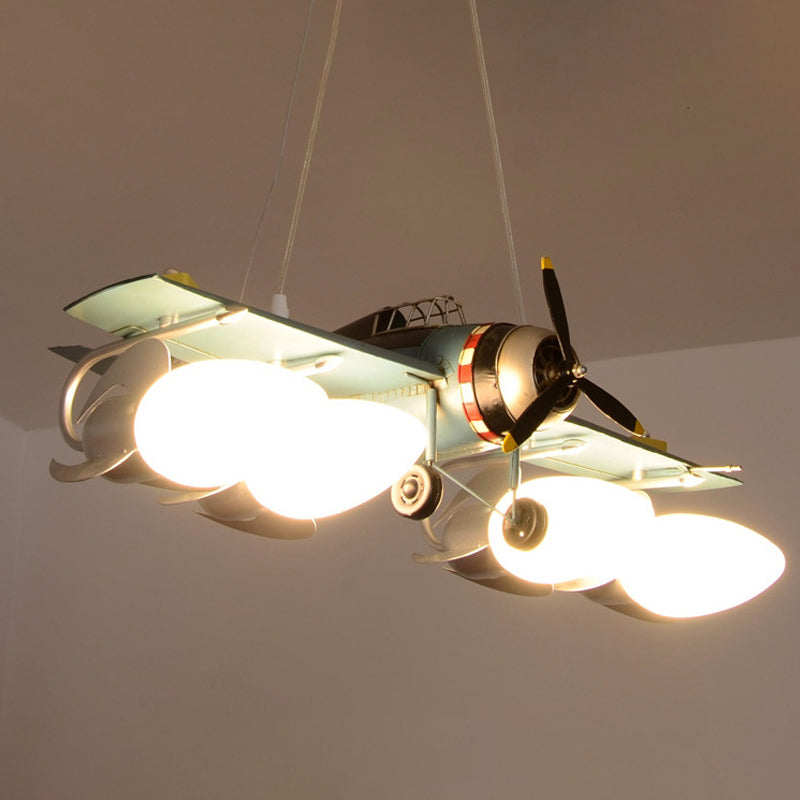 Cream Glass Bullet Chandelier Lamp with Aircraft Design Cartoon 4-Light Green Pendant Lighting
