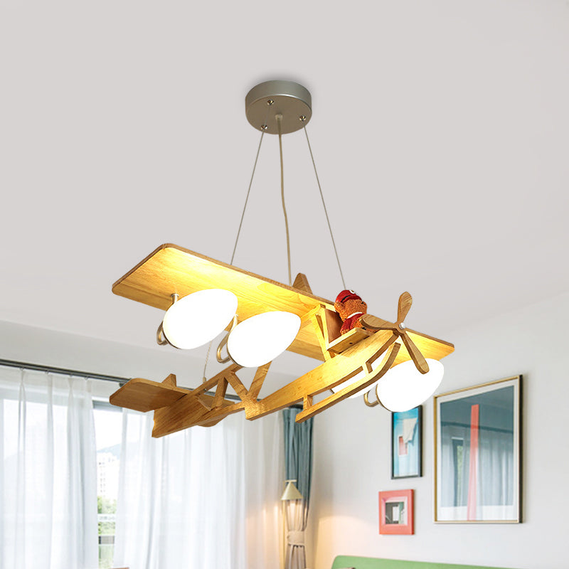 Aircraft Kids Bedroom Pendant Lighting Wood 4-Head Cartoon Chandelier in Beige with Bullet White Glass Shade