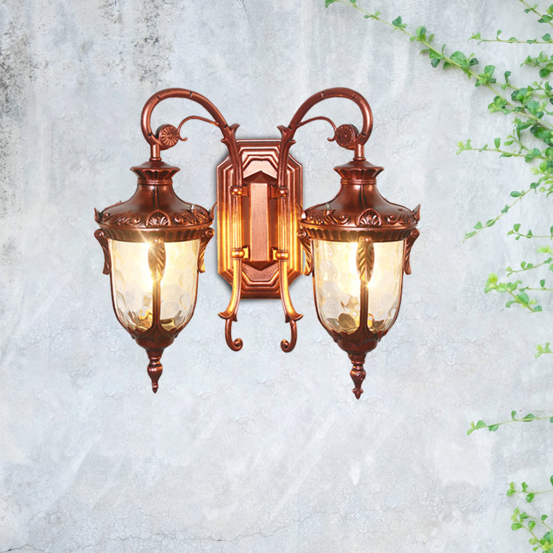 2-Bulb Clear Glass Wall Light Countryside Black and Gold/Copper Urn Courtyard Wall Sconce Lighting