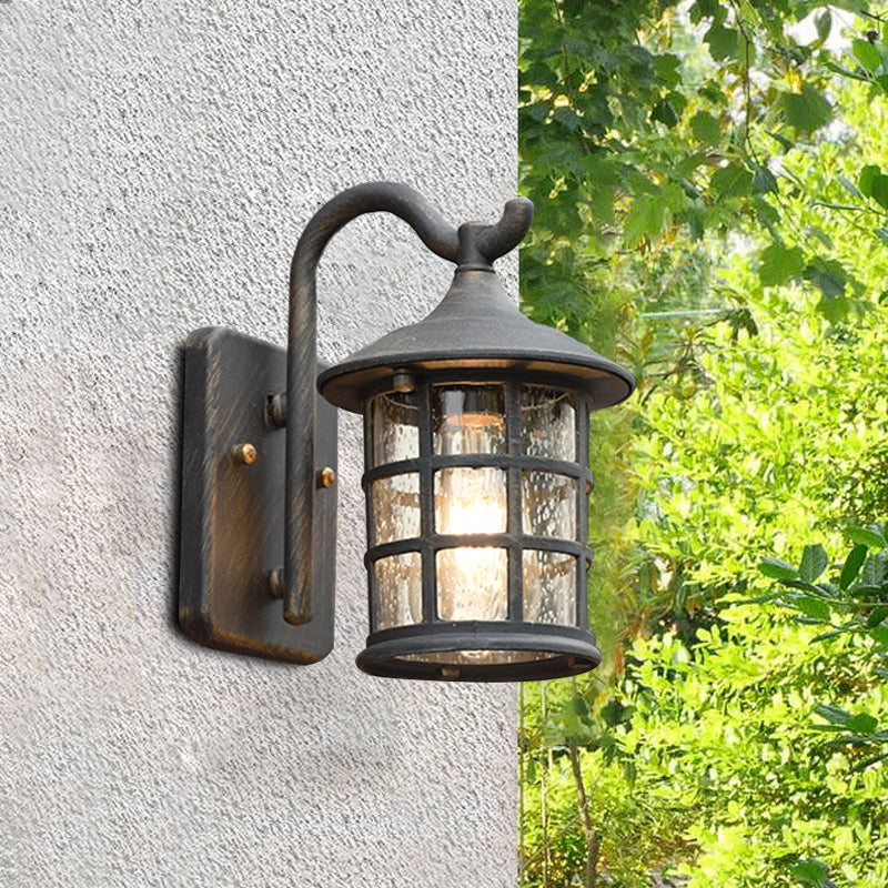 Geplaatste glazen lantaarn wandlamp platteland een lichte buitenmuurlicht in brons/zwart
