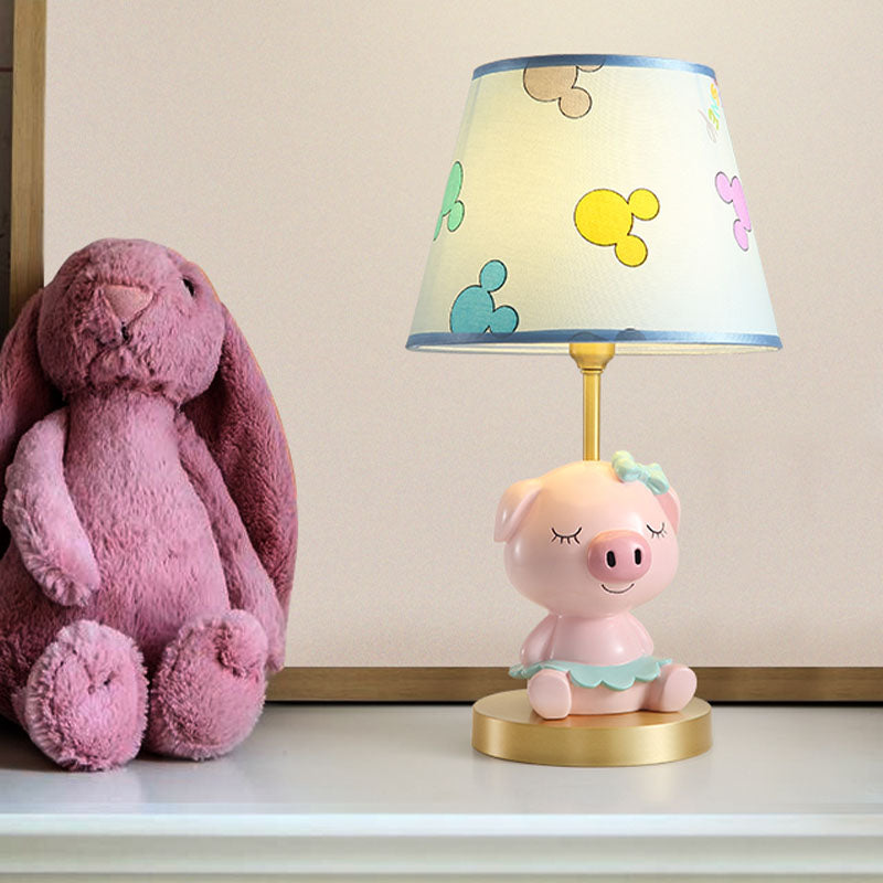Afdrukstof taps toelopende tafellamp cartoon 1-licht blauw/roze nachtkastje licht met varkensvoetstuk