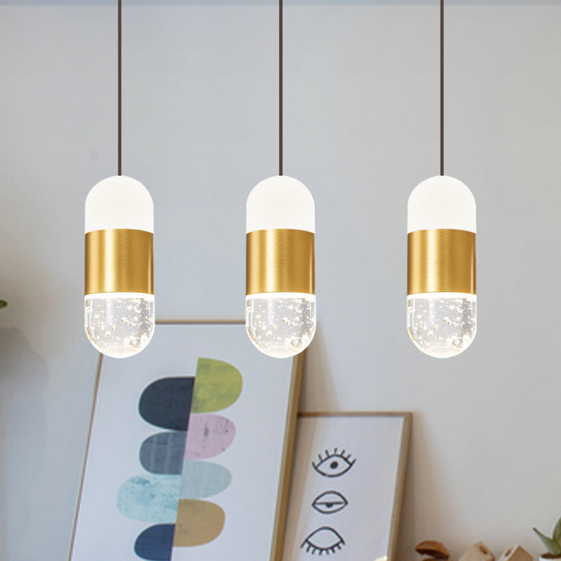 Brass 3-Head Cluster Pendant Minimalist Seedy Crystal Capsule Hanging Ceiling Light for Dining Room