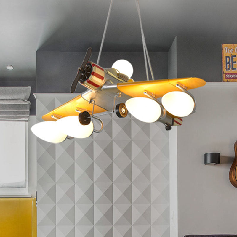 Yellow Aircraft Chandelier Lamp Cartoon 4-Light Metal Suspension Light with Cream Glass Shade