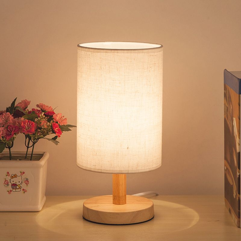 Attività del cilindro in tessuto illuminazione giapponese 1 lampada da lettura in lampadina in bianco/lino con base in legno