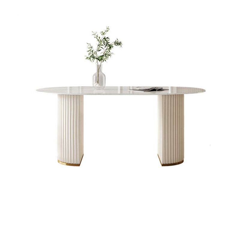 Table à manger ovale en pierre avec base blanche moderne pour salon