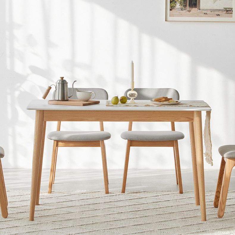 Moderne stijl gesinterde stenen eettafel witte rechthoekige tafel met houten basis