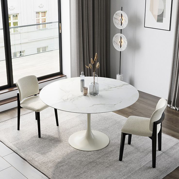 Dinettetafel in eigentijdse stijl, rond stenen meubilair met tulponderstel