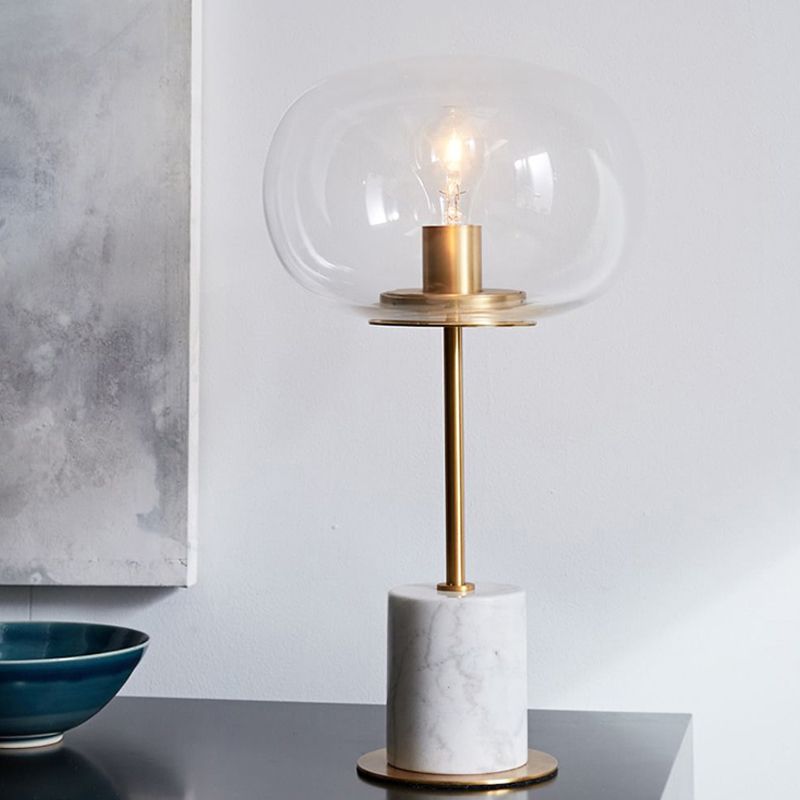 Luce notturna ovale in vetro trasparente minimalista 1 lampadina Illuminazione da tavolo in ottone e bianco con base cilindrica in marmo