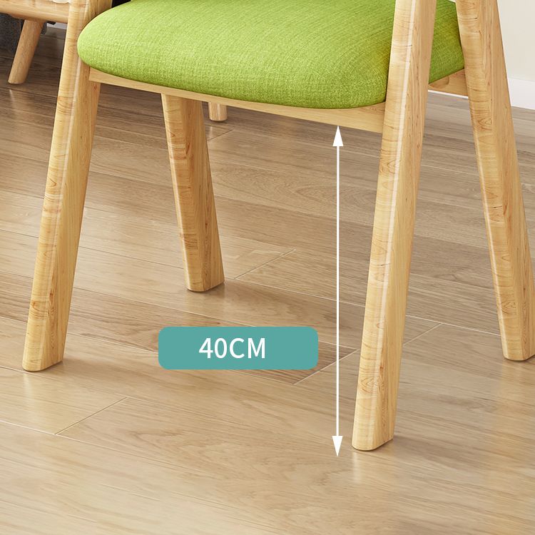 Silla de comedor tapizada escandinava con respaldo abierto y acabado mate (juego de 4)