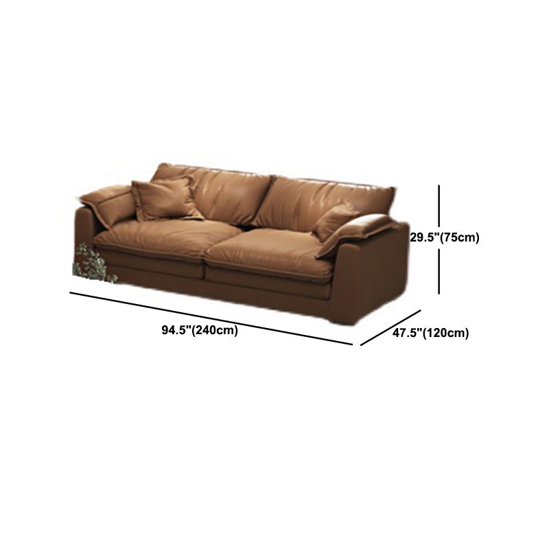 Glam Style Sofa Bed with Sponge Upholstery Filled Orange Faux Leather Sofa