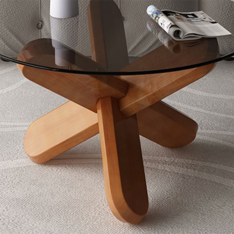 Modern Round Glass Top Coffee Table with Abstract Wooden Leg