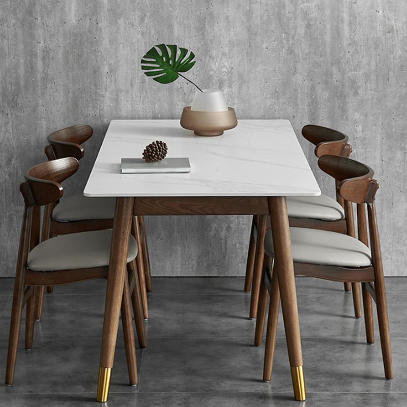 Table à manger de luxe traditionnelle table de pierre fritrée blanche avec 4 jambes