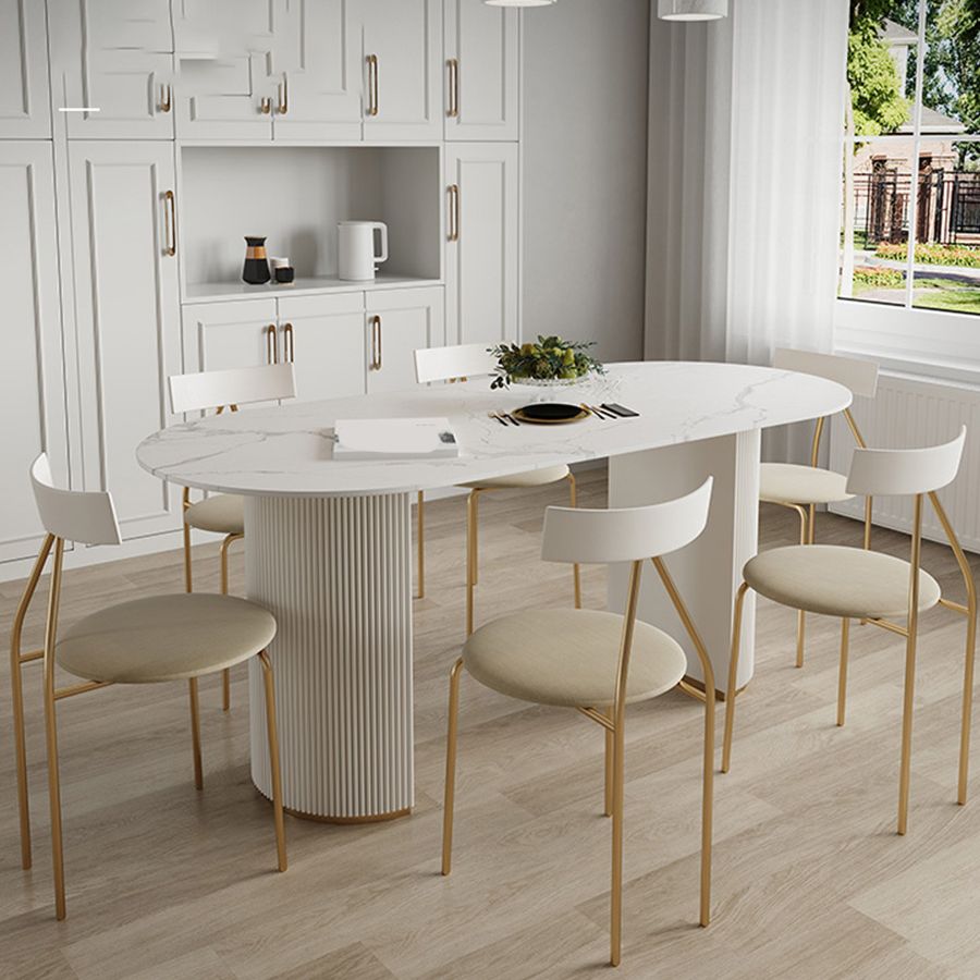 Table à manger ovale en pierre avec base blanche moderne pour salon