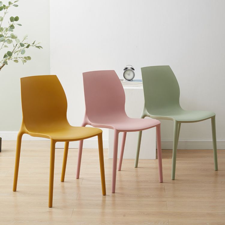 Scandinavian Armless Dining Chairs Plastic Indoor Stackable Solid Back Side Chair