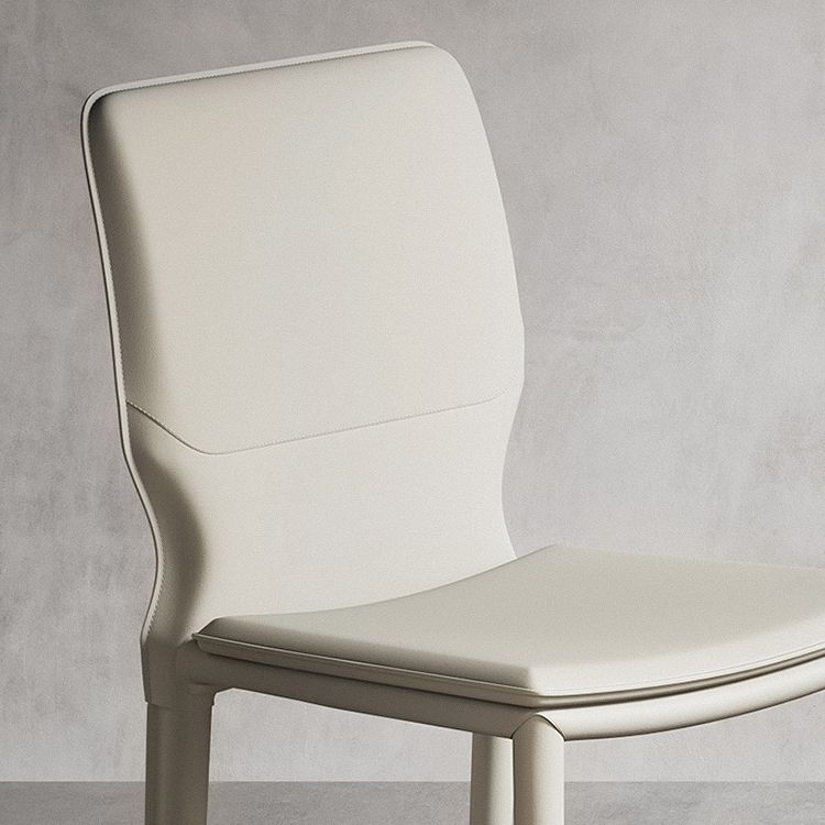 Sillas laterales contemporáneas sin brazos con respaldo sólido Sillas de comedor de cuero