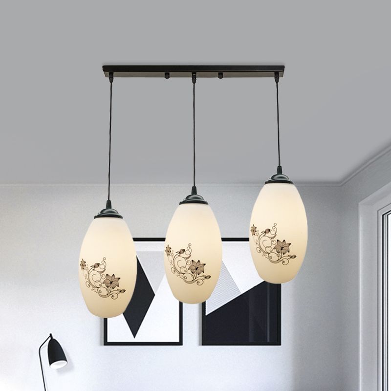 3 Lights Oval Multi-Pendant Modern Black Finish White Printed Glass Ceiling Hang Fixture with Round/Linear Canopy
