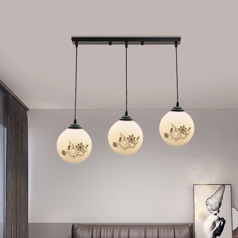 Black Sphere Multi Ceiling Lamp Modernism White Printing Glass 3-Light Dining Room Pendant with Round/Linear Canopy