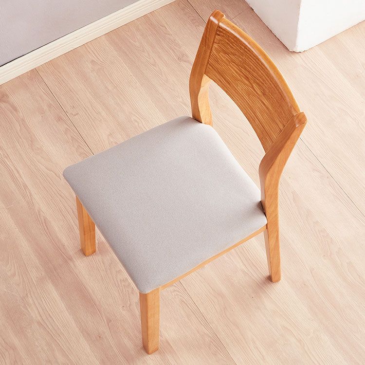 Silla lateral abierta moderna de madera de caucho Silla de comedor de madera con acabado mate