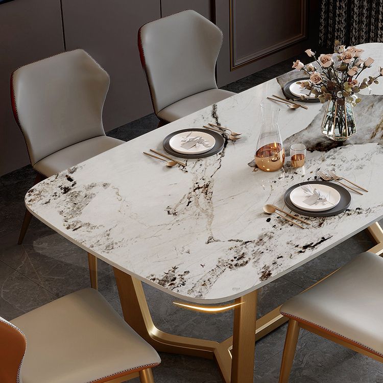 Mesa de comedor de piedra sinterizada de lujo tradicional mesa rectángulo con base de caballete dorado