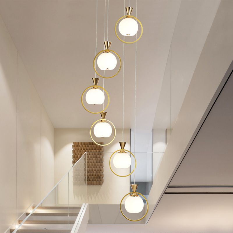 Sospensione a forma di palla Light Simplicity White Glass scale a 6 luci Multi pendente con anello di metallo in oro