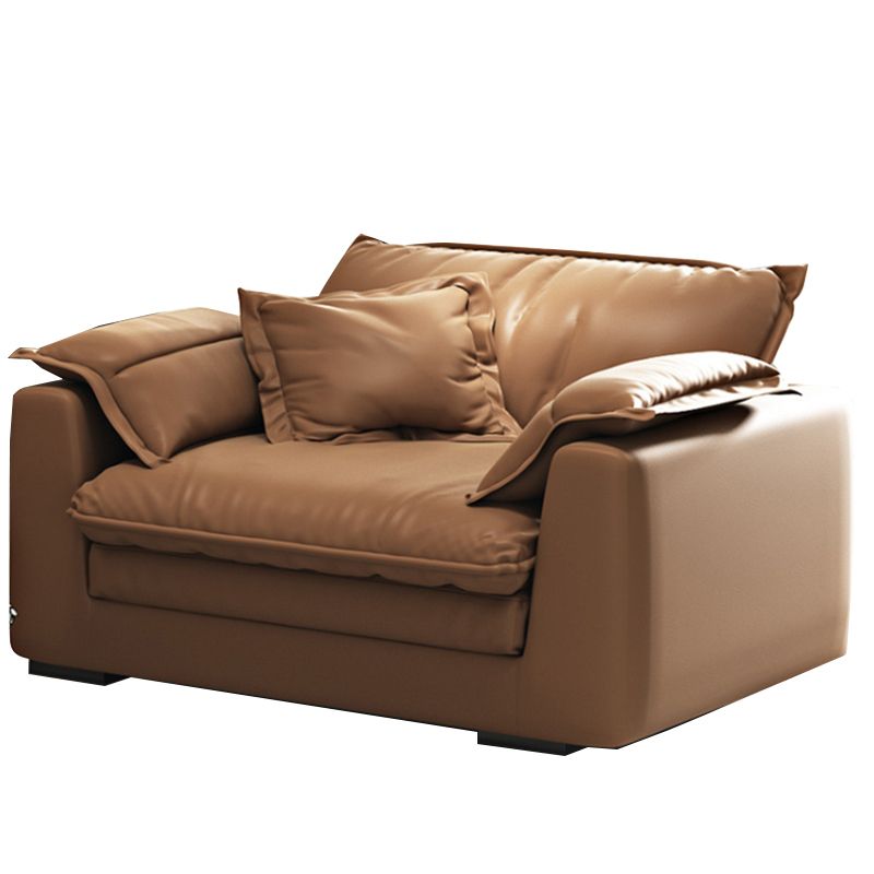 Glam Style Sofa Bed with Sponge Upholstery Filled Orange Faux Leather Sofa