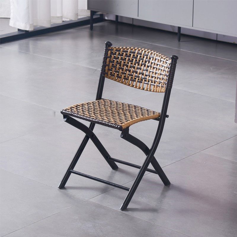 Tropical Dining Side Chair in Brown/Black Plastic with Open Back