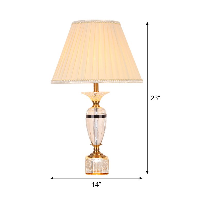 Distallo in tessuto in tessuto Urn Forma Light Modernist Crystal Faceted 1 lampada da tavolo notturno in bulbo in beige
