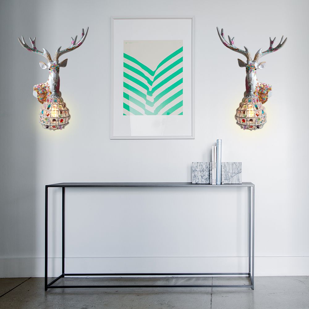 Application de cerf traditionnelle 1 Éclairage mural en résine lumineuse en noir / rose / jaune pour chambre avec une nuance de cristal de gouttelettes, droite / gauche